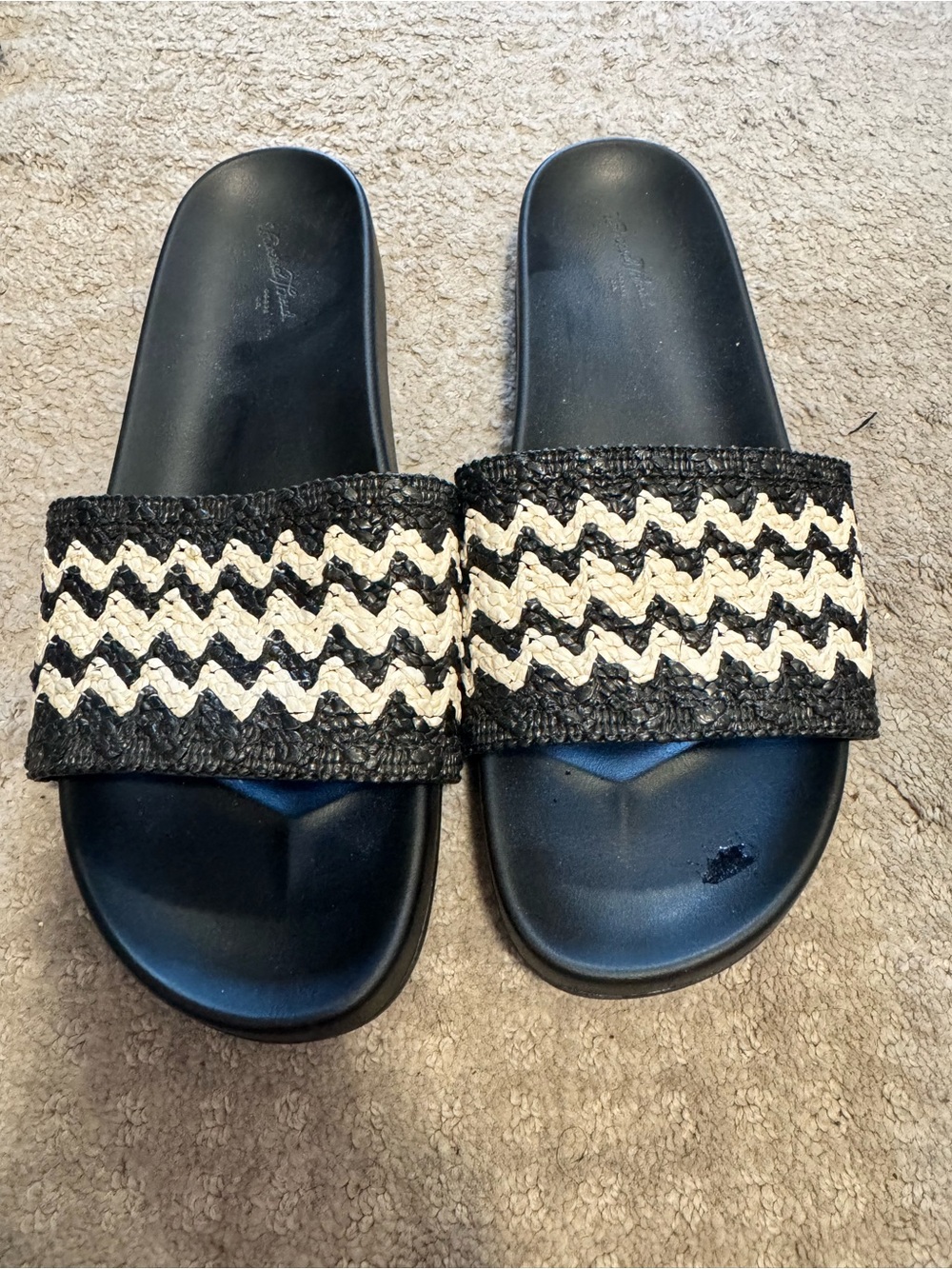 Universal Tjeead Black Slide Sandals with Chevron Straw Strap